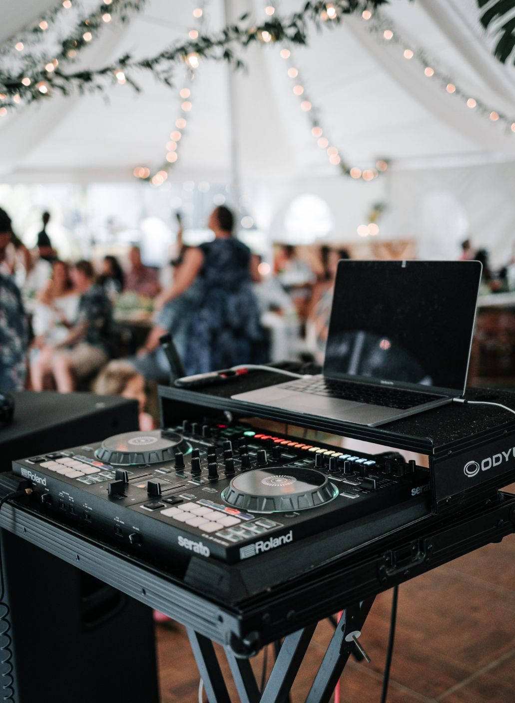 Dj equipment set up on top of a table in a tent at an event in Alberta with talented Alberta DJs.